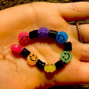 A beautiful glow in the dark smiley bracelet.